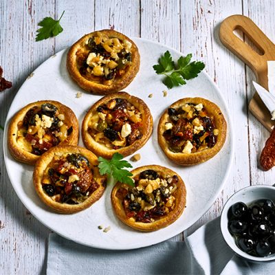 Mediterranean Feta and Onion Tarts with sun-dried tomatoes and olives Recipe