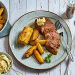Steak with Potato Wedges, Corn & Lemon Butter