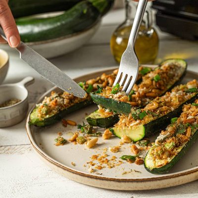 Steamed Courgettes with Crunchy Cheese and Pine Nuts Topping Recipe