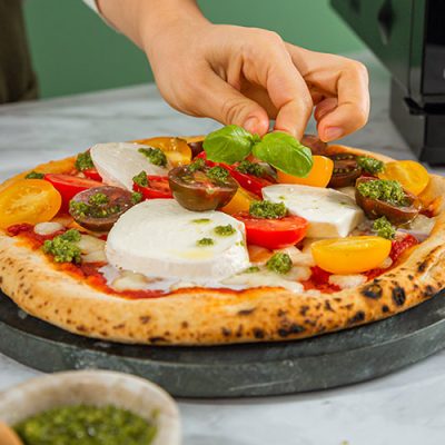 Frozen Pizza with Red and Yellow Cherry Tomatoes Recipe